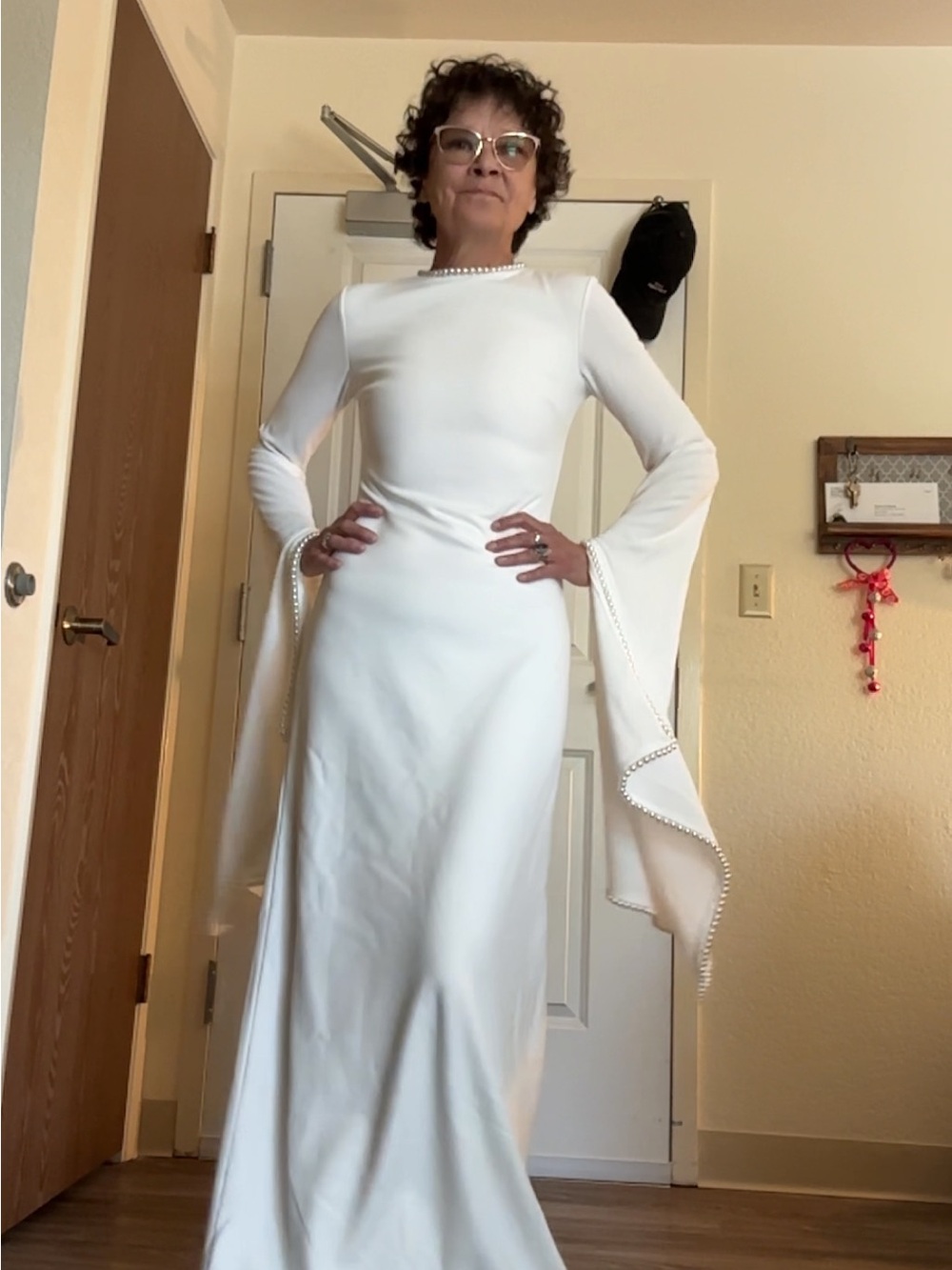 Pearl-Trim White Long-Sleeve Gown with Dramatic Fluted Sleeves